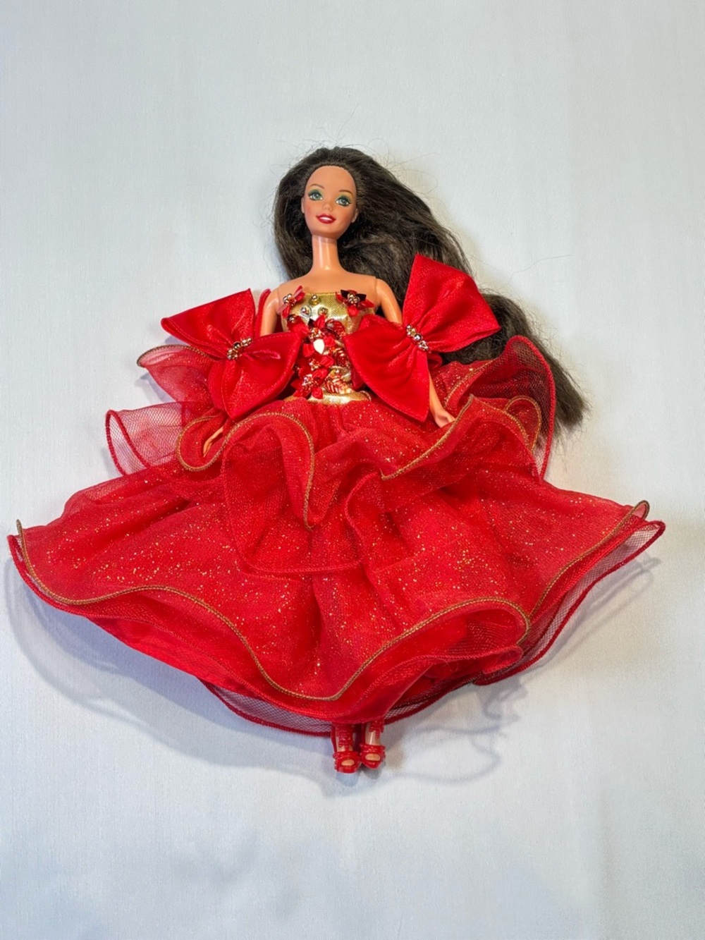 Happy Holidays Barbie doll wearing a 1993 Happy Holidays outfit.
